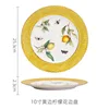 Assiette à bordure de 25 cm (10 pouces) avec liseré jaune citron.
