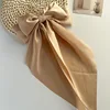 Pinza de cocodrilo color camel