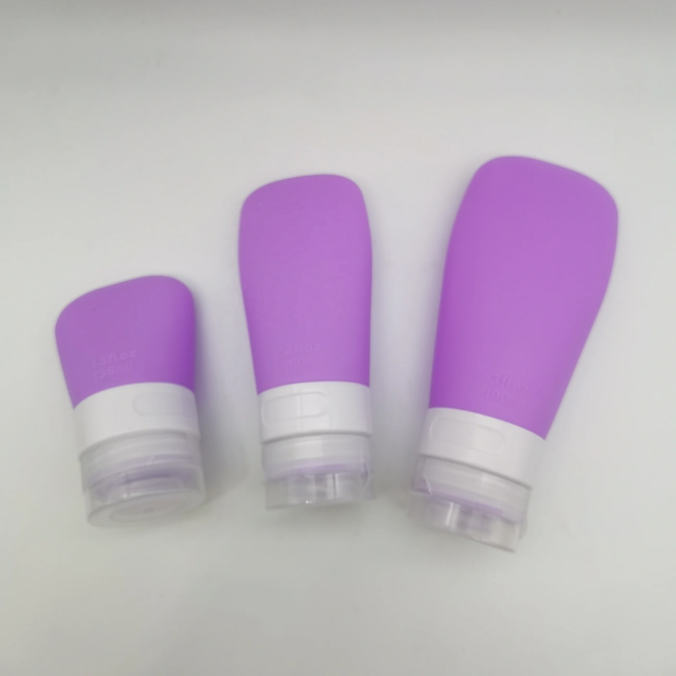 Set Da Viaggio 4 Pezzi In Silicone Alimentare - Bottiglie Morbide E Riempiibili, Antigoccia E A Prova Di Perdite Per Shampoo E Lozioni, TSA Approved - 2
