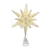 White starburst tree-top star