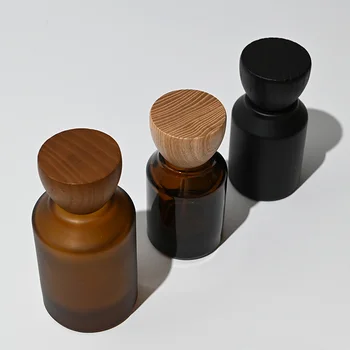 Top fashion round shape amber black frosted 30ml 50ml 100ml empty round perfume bottle with wooden lid