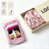 Confezioni colorate con foro per appendere