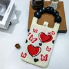 Corazones negros y rojos
