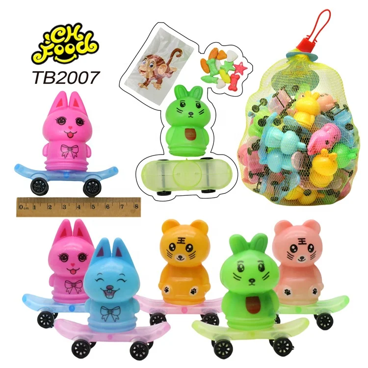 Wholesale and OEM Cartoon Animal Shape Scooter Toy with Fruit Flavor Tablet Candy and Tattoo for Kids