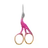 Red gold crane scissors
