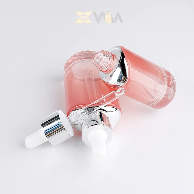 Glow-Elliptical 30ml 50ml Custom Color Clear Glass Bottle + Gold Stamping for Peach Blossom Perfume Oil