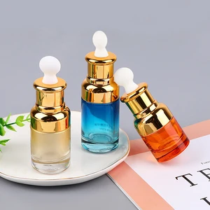 20ml 30ml 1OZ 50ml Luxury Glass Bottle with Electroplated Shoulder and Uniquely Shaped Rubber and Ring Dropper Glass Bottle