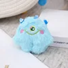 Delicato peluche blu mostro dagli occhi grandi di tre generazioni 10 cm
