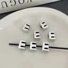 อี