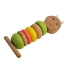 Caterpillar threading colorful sticks