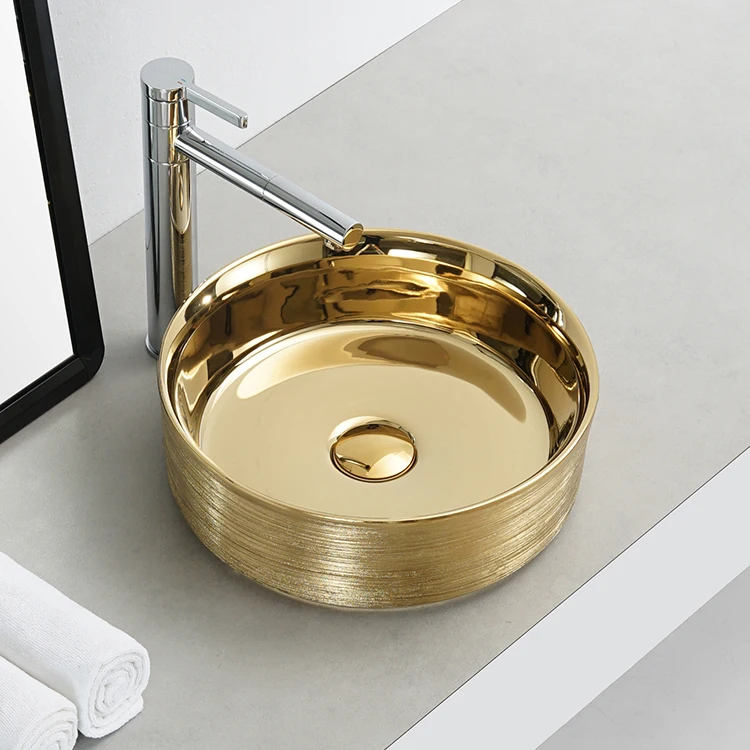 Round golden plated luxury ceramic sanitary wares table counter top washbasin bathroom sink art basin gold face hand wash basin manufacture