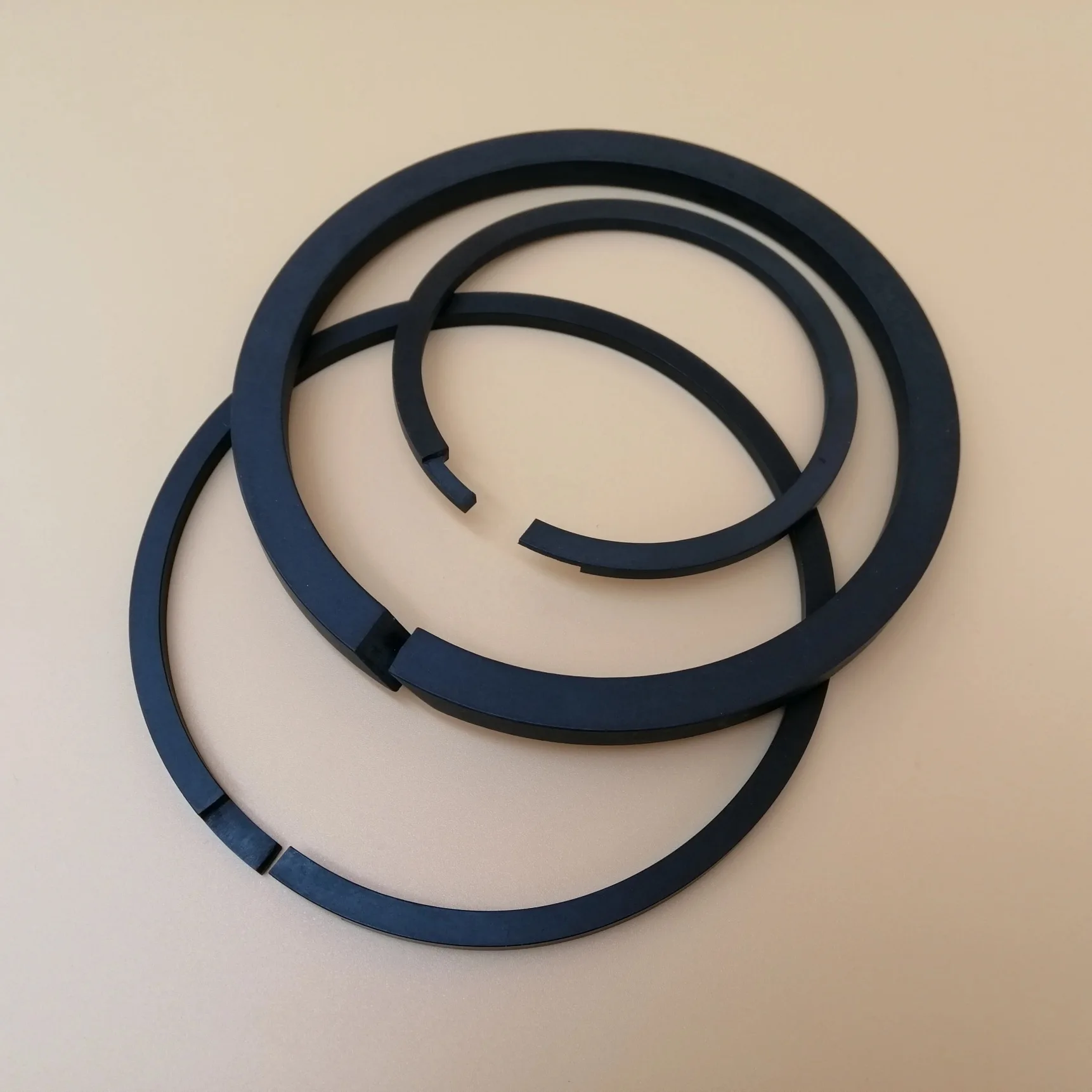 Factory Outlet High Performance Carbon Filled PTFE PEEK Piston Support Ring of CNG LPG Piston Compressor