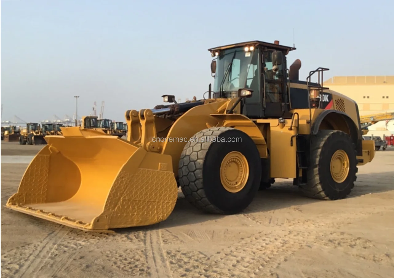 980 в тоннах. Погрузчик кат 980. Катерпиллер 980l. Погрузчик Cat 986k. Caterpillar 963k.