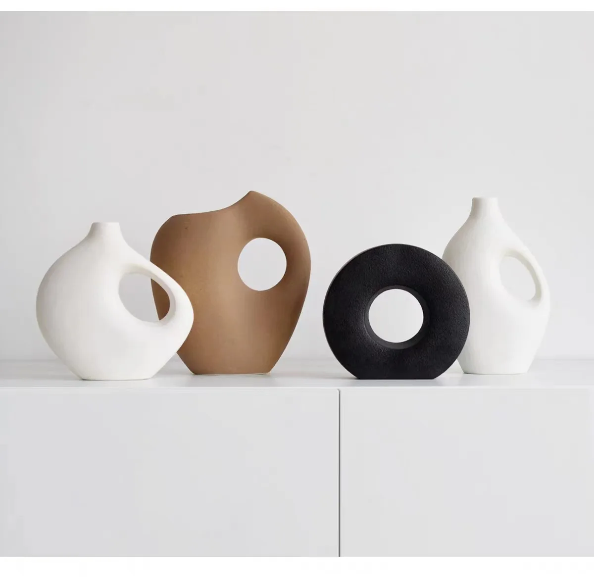 Nordic Ceramic Beige Decoration curvilinear shape Flower Vase Home Wedding Table Art Vase.jpg