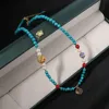 GN0714-12 Collana con pendente della fortuna turchese