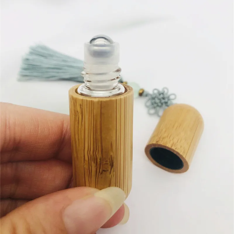 New Style 1ml 2ml 3ml 5ml Cute Refillable Bamboo Roller Bottle Essential Oil with Steel Roller Ball and Tassels