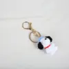 White snoopy with blue hat-gold buckle