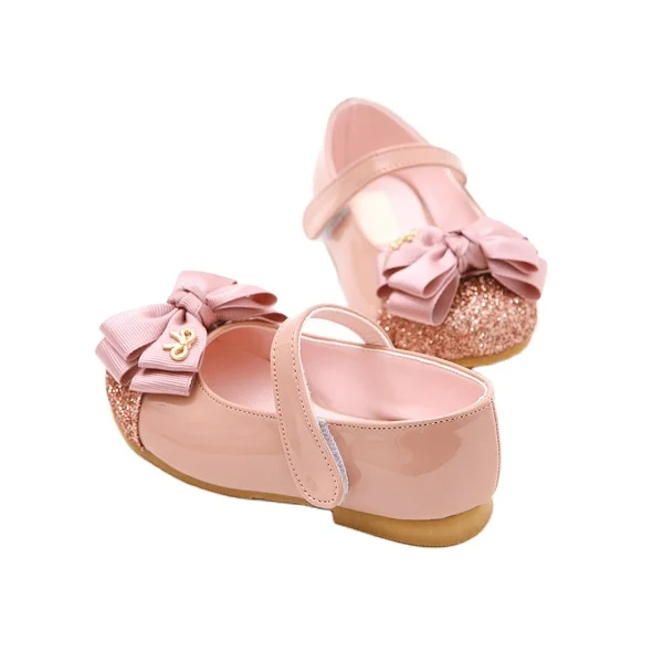 Zapatos de fiesta para niña de charol rosa, diseño de lazo bonito
