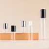 Clear bottle + steel roller ball + black aluminum cap