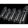 Transparent bottle with graduations and black pointed nozzle