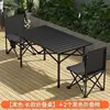 Mesa negra y plateada de 120cm de largo y dos sillas plegables de 36cm.