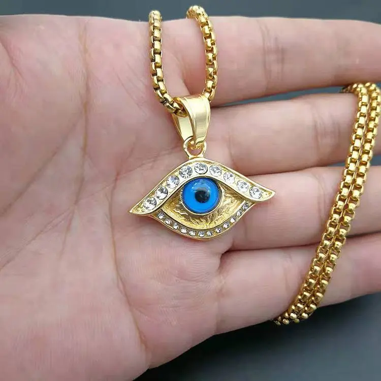 gold necklace with blue eye