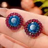 Pendientes de cristal con punta azul en oro negro