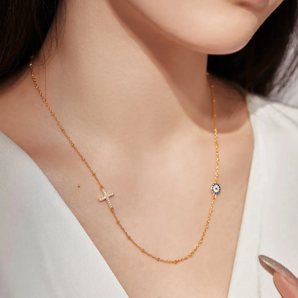 KAKODIY Water Drop Delivery Fine Jewelry Turkish Blue Magic Eye Pendant Necklace Paved Cubic Zirconia Cross Necklace for Women detail 3