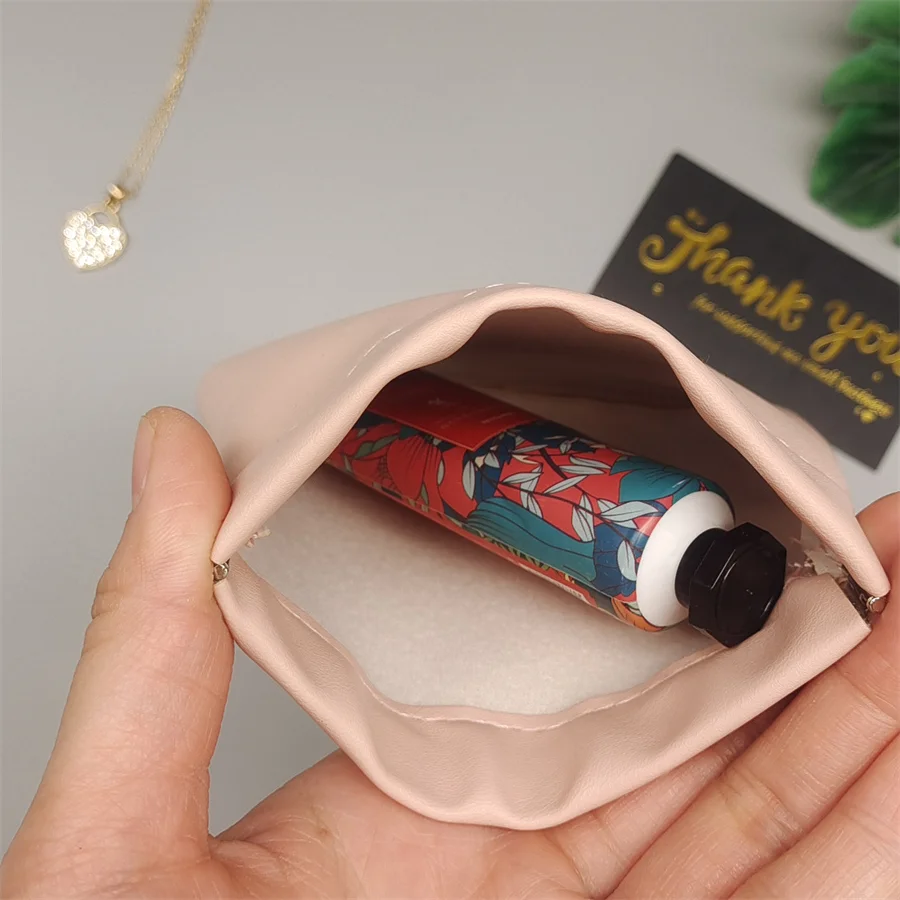 Custom Emboss Printing Squeeze Pu Leather Bag for Coin Jewelry Storage Closing Magnet Leather Jewelry Pouch