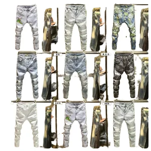 High Quality Custom Embroidered Men's Mid-Rise Baggy Jeans Street Hip Hop Style Denim Trousers with Button Decoration for Spring