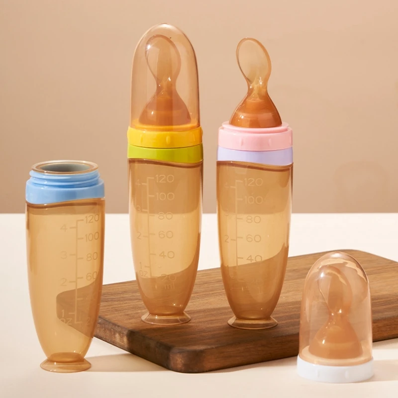 Beliebte 120 ml BPA-freie Baby-Silikonknetfütterflasche mit Löffel Säuglings-Reisflockenfütterer Babyfütterprodukte