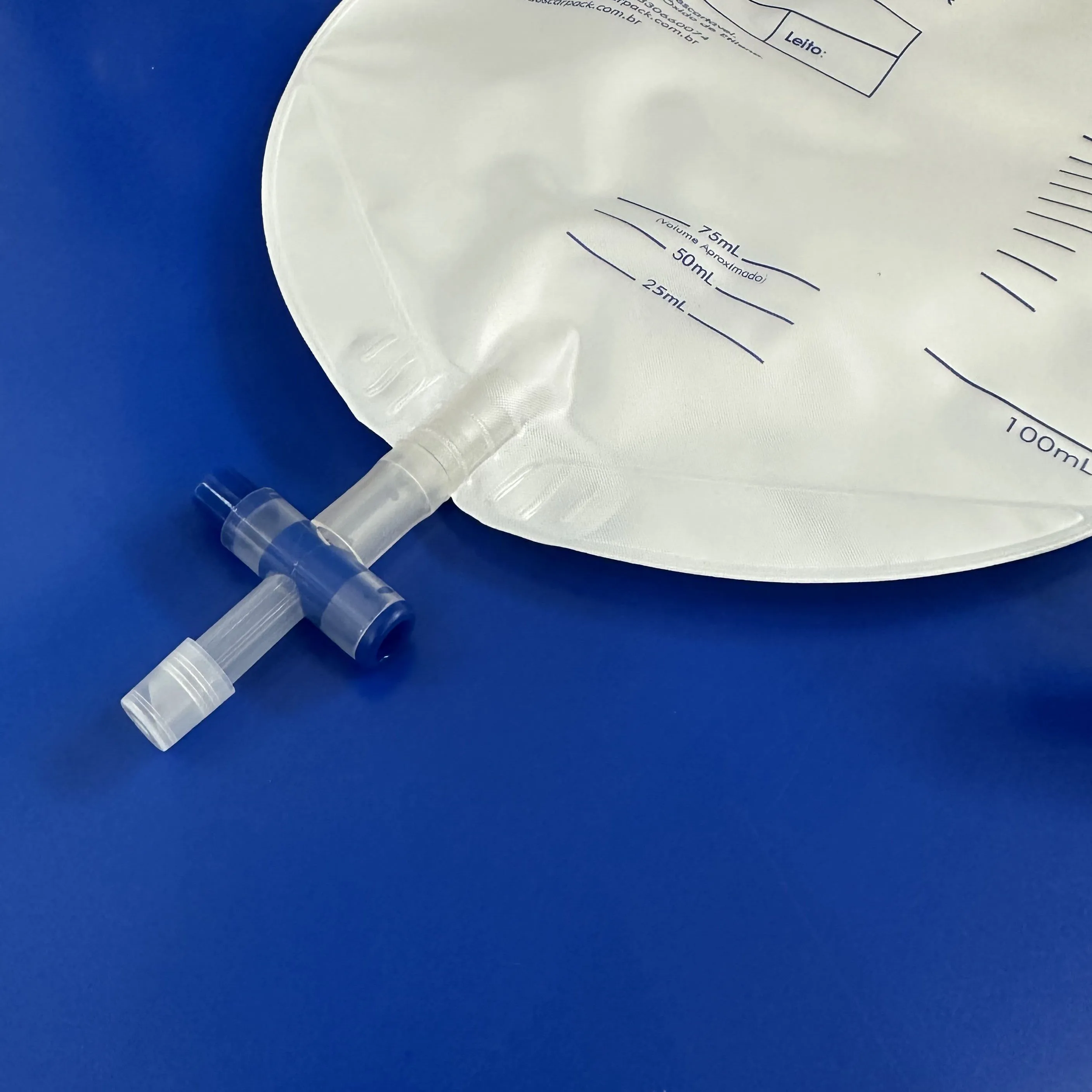 Disposable 2000ml medical luxury adult urine drainage bag with cross(T-tap) valve supplier