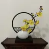 Horizontal screen, small white teapot, yellow plum blossom