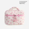 Bolso bombonera con lazo rosa y blanco.