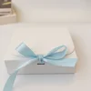 White + Blue Ribbon