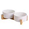 White double bowl with wooden frame