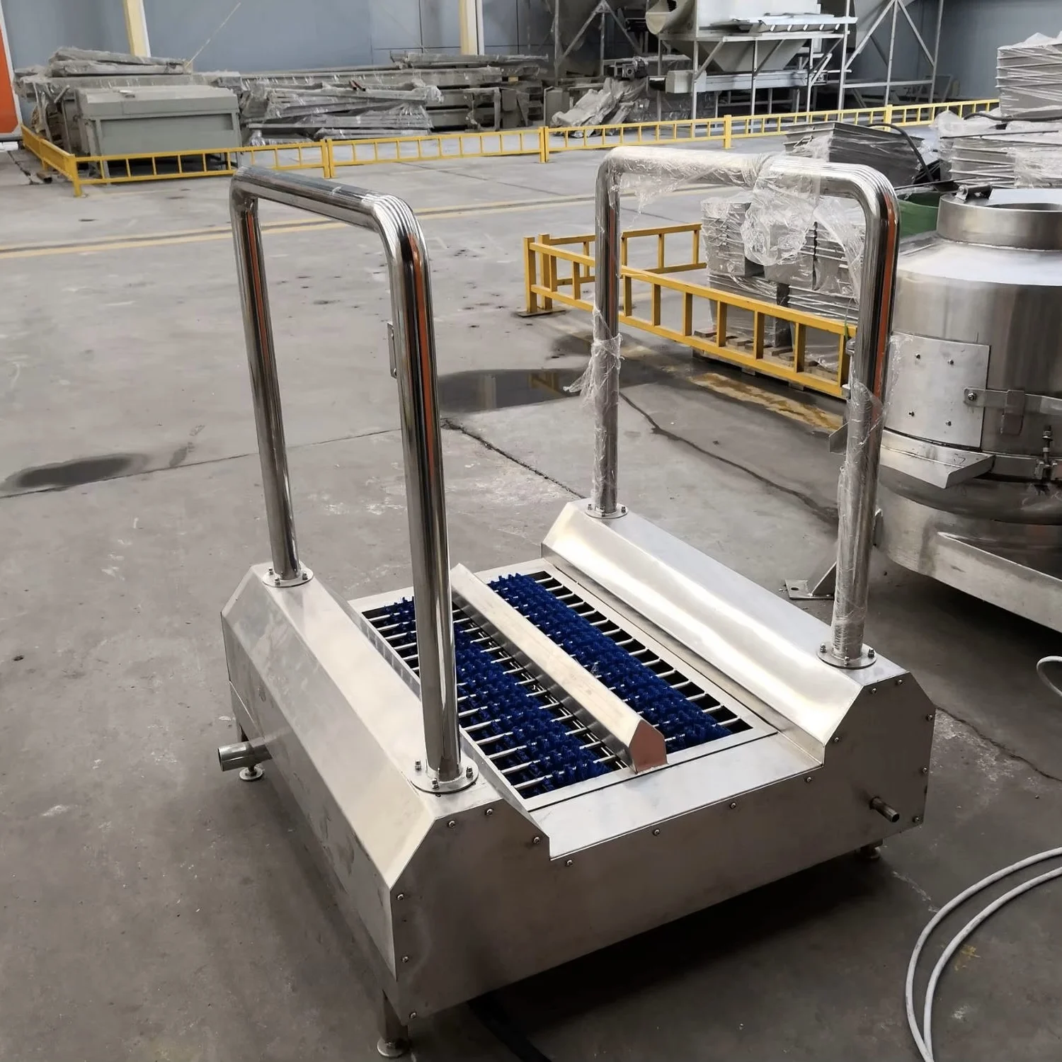 Industrial stainless steel boot cleaner for hygiene control in slaughterhouses and food processing plants