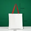 Bolso tote rojo de 34*38 con asa de lona blanca.