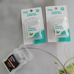 Daily Care FDA CE Certificate Eco-friendly Black Color Dental Floss Bamboo Charcoal Added Deep Clean Teeth Flosser Mint Flavor
