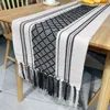 Runner da tavolo nero con nappine multi-diamante
