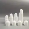 Bouteilles blanches avec des couvercles ronds