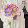 Deep pink lollipop hydrangea amaryllis hand-tied bouquet