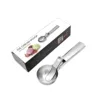 Large silver ice cream scoop in colorful box