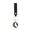 Two-tone pendant with leather cord