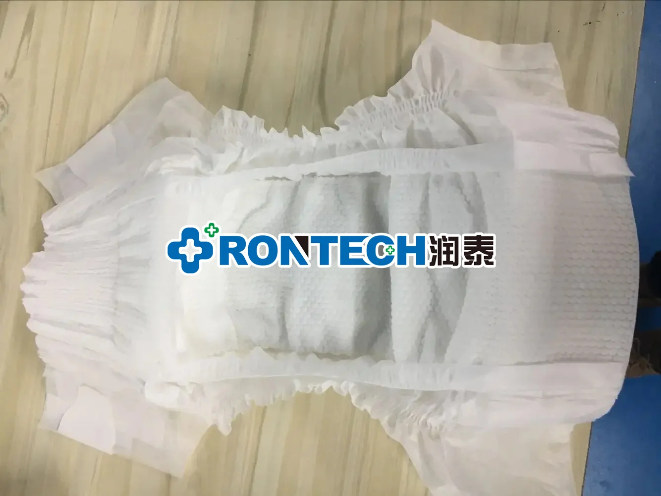 Fully Automatic High Speed Full Servo  Waistband Baby Diaper Production Line Highly Absorbent Lovely Baby Diaper Making Machine