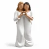 Juego de figuras de resina de hermanas