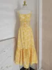 Abito giallo con spalline