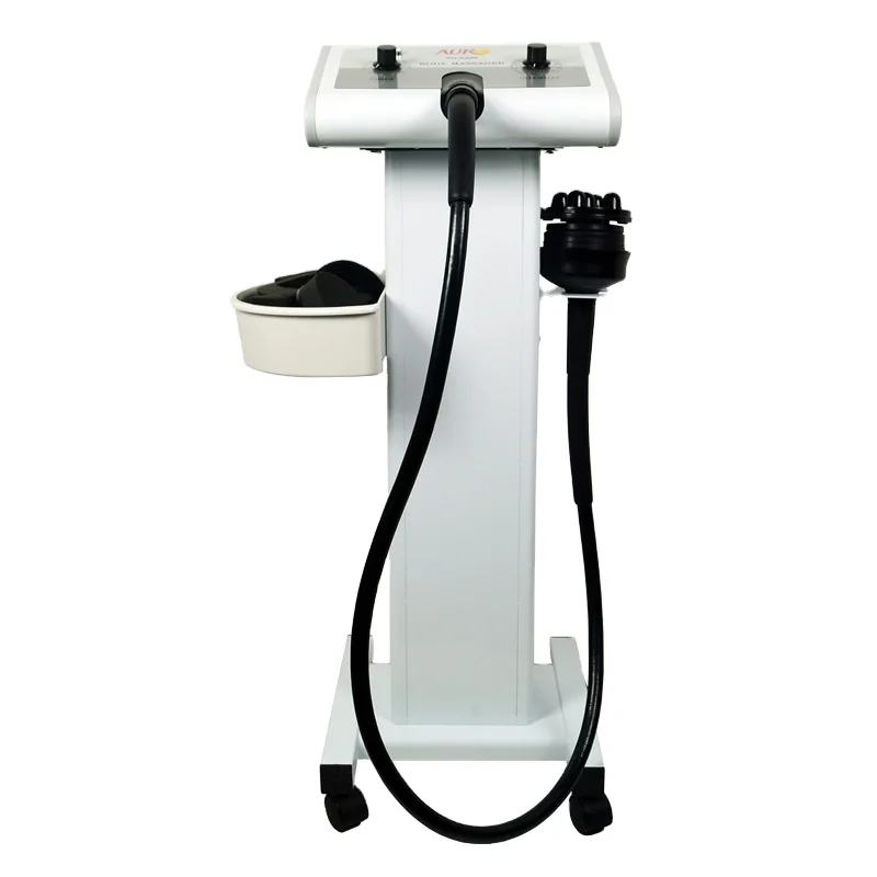 vibrating thumb ring Electric Massager Machine for Body Massage in a Case on a Black Background  Stock Photo main image 1