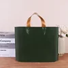 Dark Green with gold handle