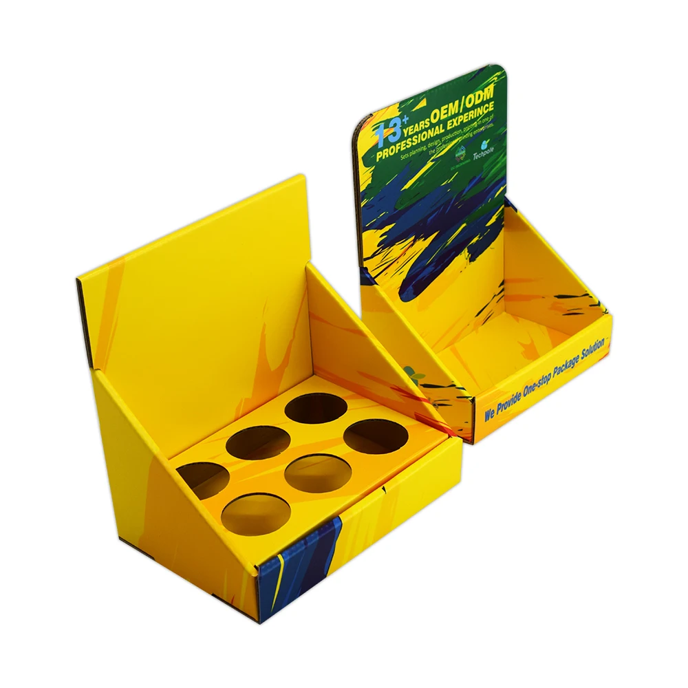 Corrugated Cardboard Retail Display Box with Matt Lamination and Embossing for Cosmetics Counter Stand with Holes